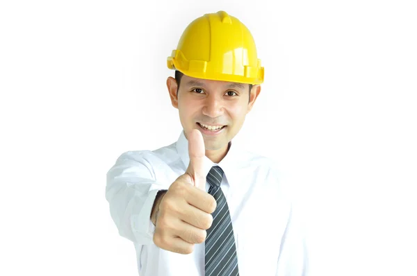 Smiling Asian architect (or engineer ) with yellow hard hat giving thumbs up — Stock Photo, Image