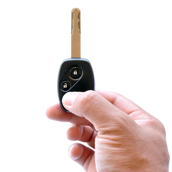 Hand holding a car key — Stock Photo, Image