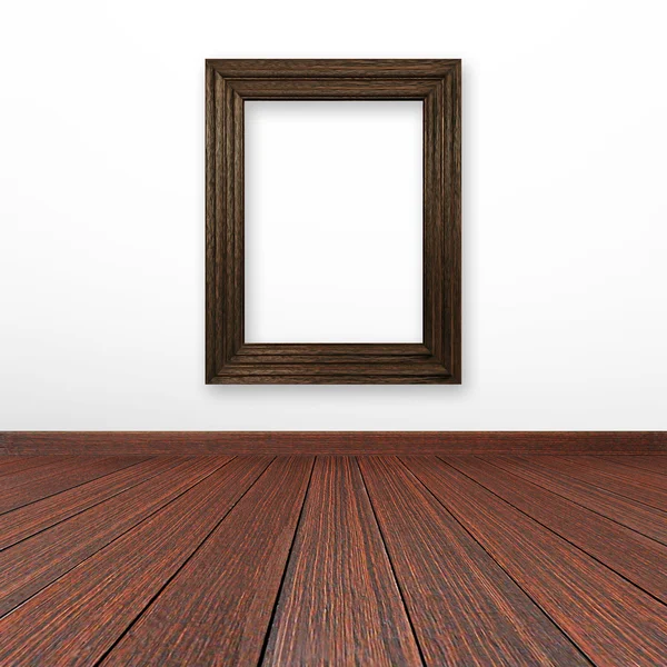 Wooden picture frame on the wall — Stock Photo, Image