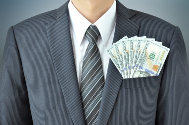 Doları banknot işadamı'nın takımdan cebinde