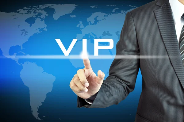 Zakenman hand aanraken van VIP-teken — Stockfoto