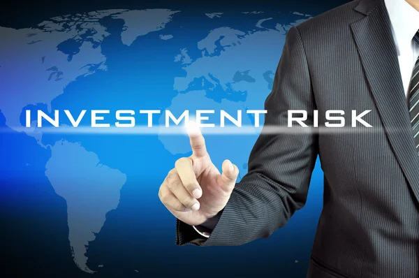 Hand touching INVESTMENT RISK words — Stock Photo, Image