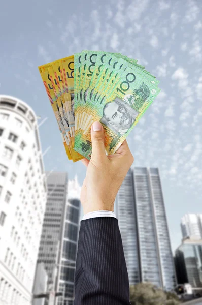 Hand holding Australian dollar banknotes — Stock Photo, Image