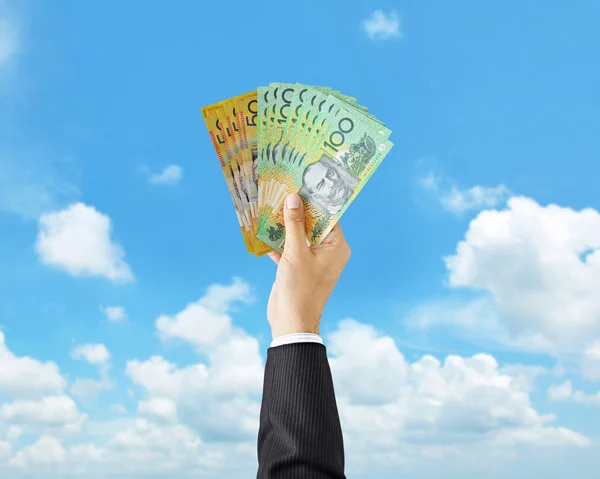 Hand holding Australian dollar banknotes — Stock Photo, Image