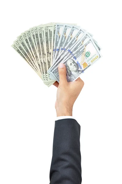 Деловой человек держит доллары за руку — стоковое фото