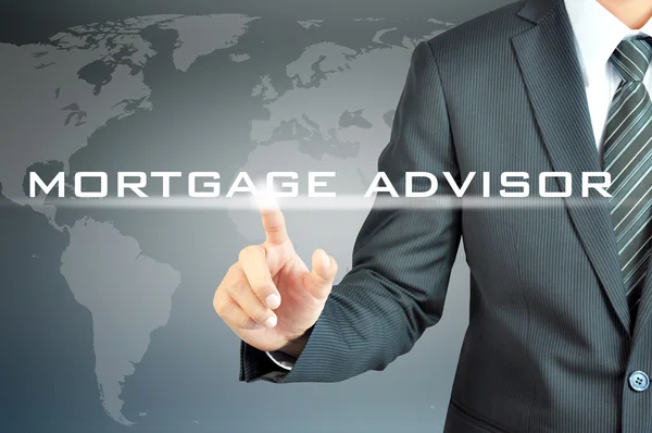 Рука торкається MORTGAGE ADVISOR слів — стокове фото