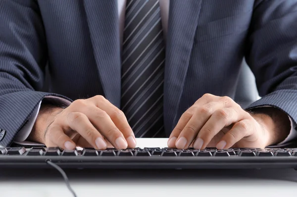 Businessman's hands typing keyboard — Stock Photo, Image