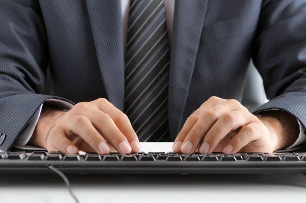 Businessman hands typing computer keyboard — Stock Photo, Image