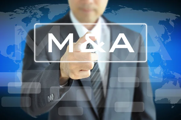 Mão tocando M & A — Fotografia de Stock