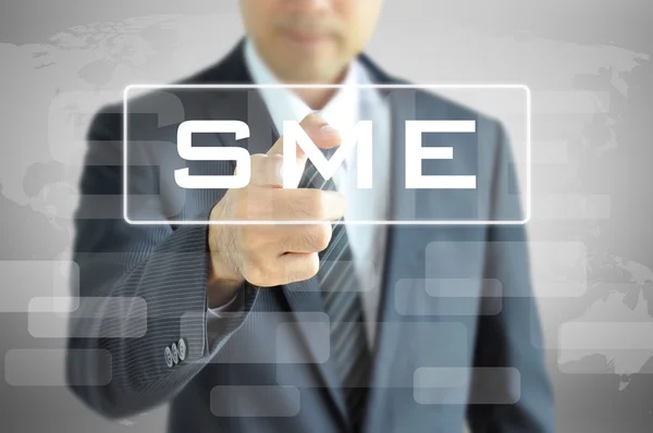 Hand pointing to SME — Stock Photo, Image