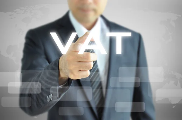 Businessman hand pointing to VAT on virtual screen — Stock Photo, Image
