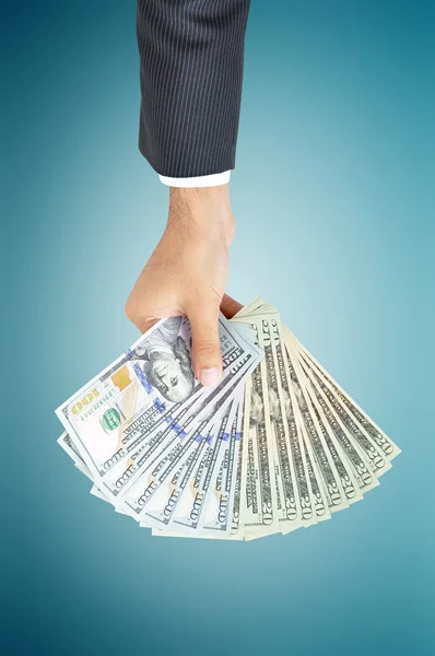 Hand giving money -  United States dollar (USD) bills — Stockfoto