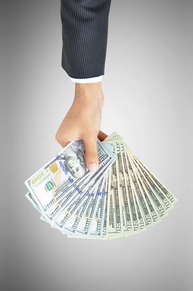 Mão dando dinheiro - Dólar dos Estados Unidos (USD) contas — Fotografia de Stock