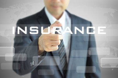 Businessman hand pointing to INSURANCE word on virtual screen