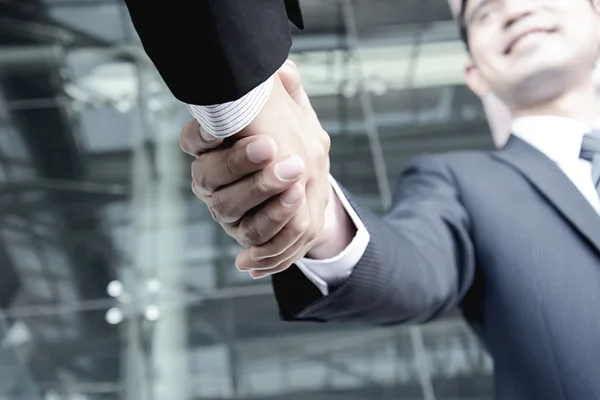 Handshake of businessmen  - greeting, dealing, merger and acquisition concepts — 스톡 사진