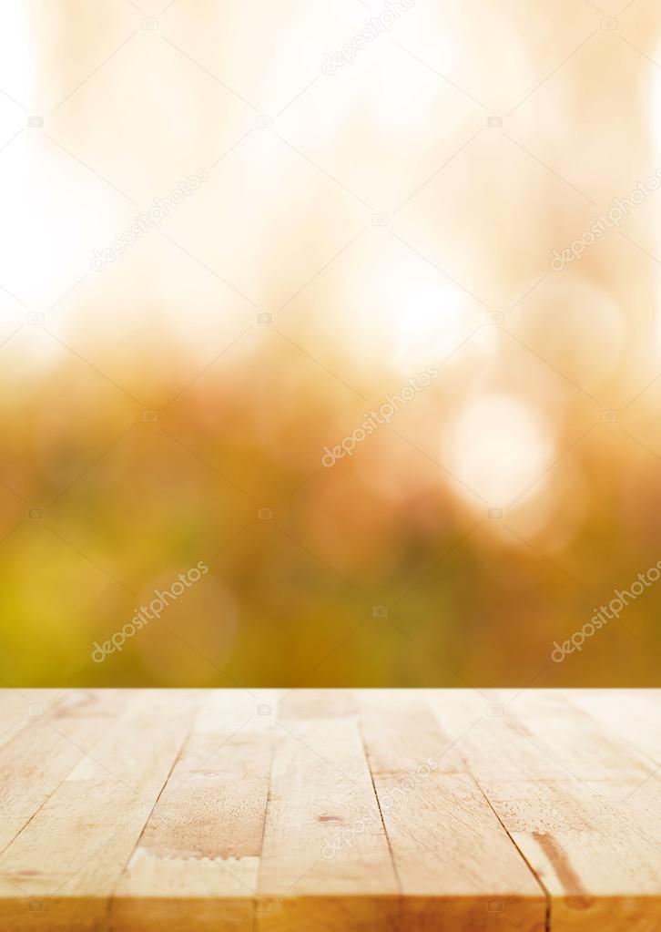 Wood table top on blurry abstract background