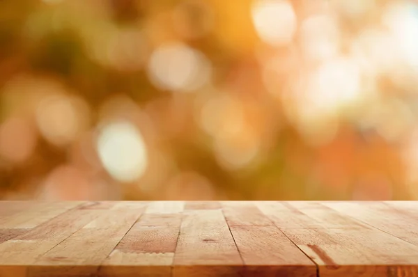 Trä table top på brun bokeh abstrakt bakgrund — Stockfoto