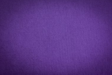 Arka plan olarak koyu mor kumaş doku