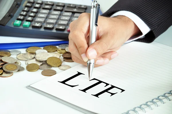 Geschäftsmann Hand mit Stift zeigt auf lft (Long Term Equity Fund) Zeichen auf dem Papier — Stockfoto