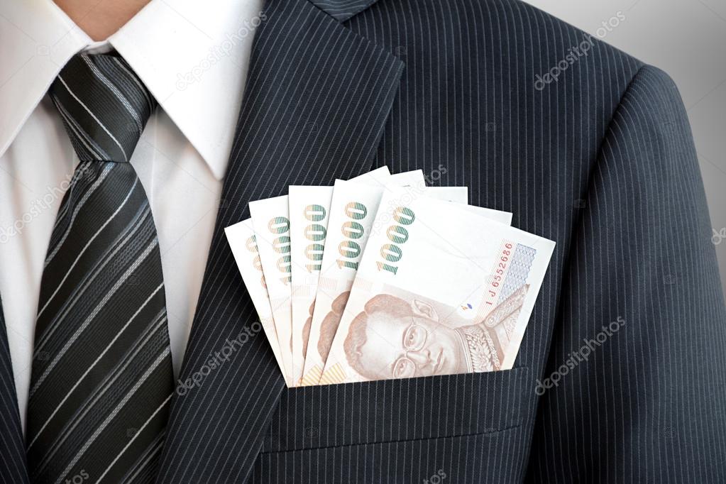 Money, Thai Baht (THB), in businessman suit pocket