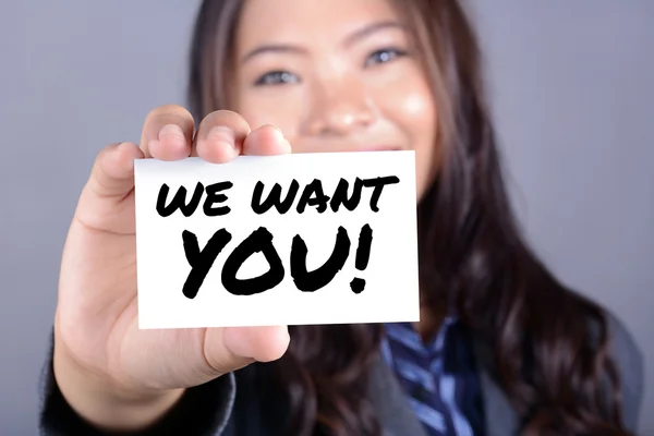 WE WANT YOU! message on the card shown by a businesswoman — Stock Photo, Image