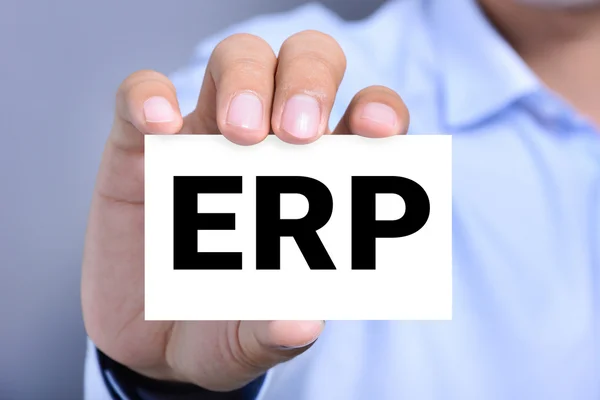 ERP letters (of Enterprise Resource Planning) op de kaart gehouden door een man hand — Stockfoto