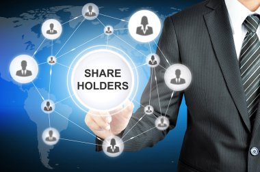 Businessman pointing on SHAREHOLDERS sign on virtual screen clipart