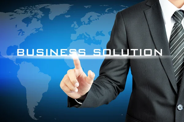 Businessman main toucher BUSINESS SOLUTION signe sur écran virtuel — Photo