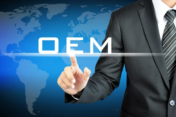 Businessman pointing on OEM (Original Equipment Manufacturer) sign on virtual screen — Stock Photo, Image