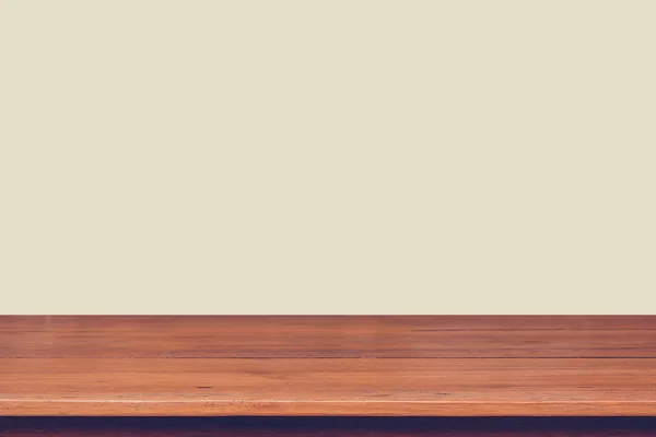 Wood table top on vintage color background — Stock Photo, Image