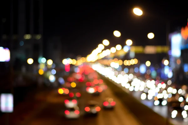 Bunte verschwommene Bokeh Hintergrund - von der Straße in der Nacht — Stockfoto