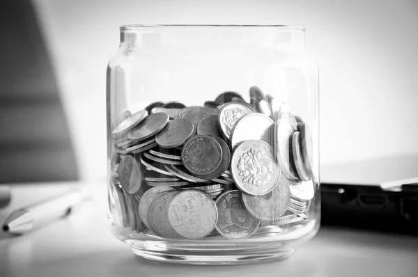 Coins in the glass jar, mixed Asian multi currencies — Stockfoto