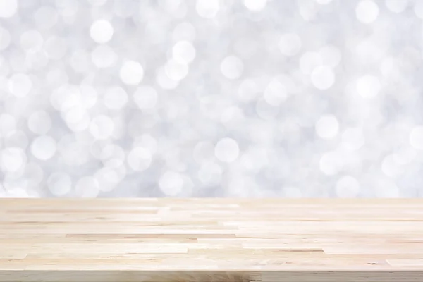 Trä table top mot glänsande bakgrund — Stockfoto