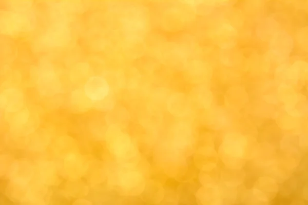 Glanzende gouden bokeh abstracte achtergrond — Stockfoto