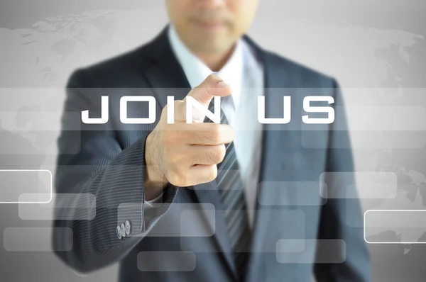 Businessman pointing to JOIN US sign on virtual screen — Stock Photo, Image