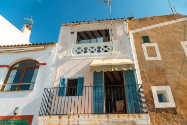  Traditional Spanish house with a balcony. Shuttered windows and balconies in Mallorca