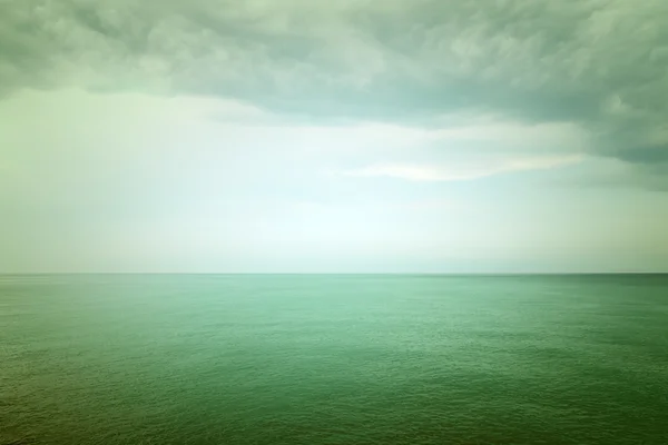 Moody green sea and clouds — Stock Photo, Image