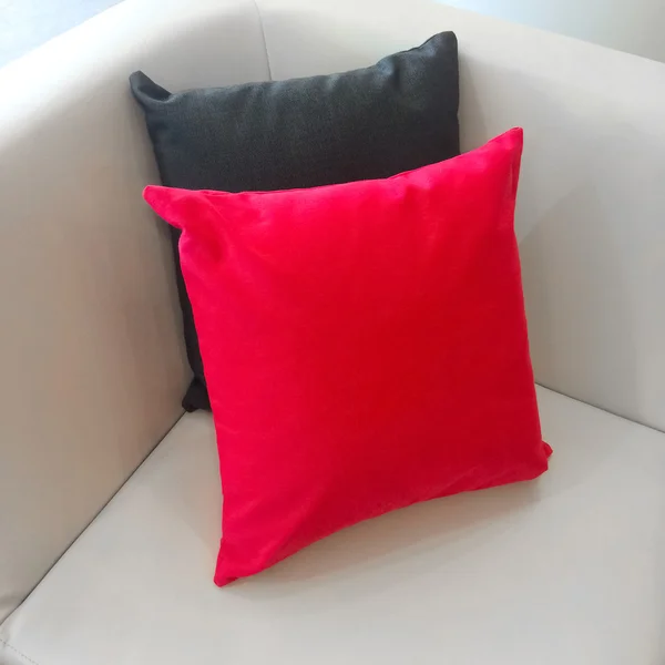 Sofa corner with red and gray cushions — Stock Photo, Image