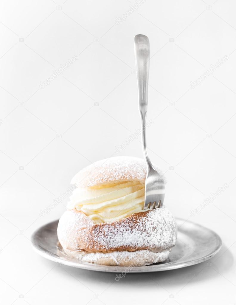 Semla cream bun on silver plate