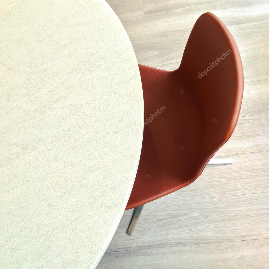 Leather chair and round marble table