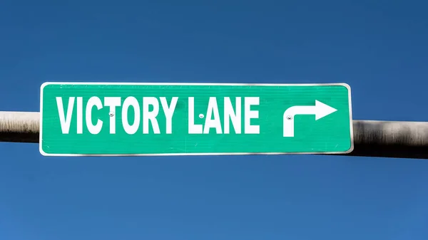 Street Sign the Direction Way to Victory Lane