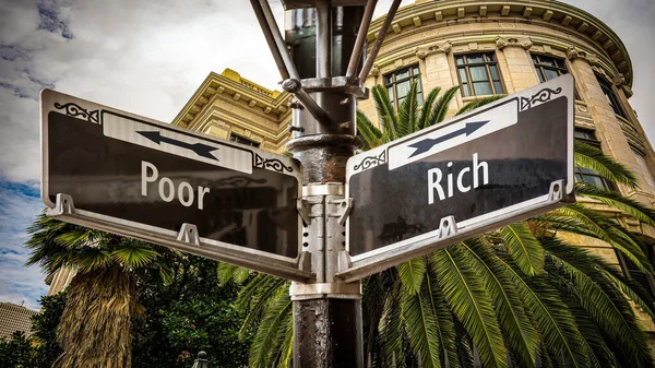 ストリートサインは 金持ち対貧乏人への方向への道 — ストック写真