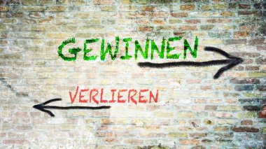Almanca 'nın iki farklı yönünü gösteren işaret direği olan bir resim. Bir yön kazanır, diğeri kaybeder.