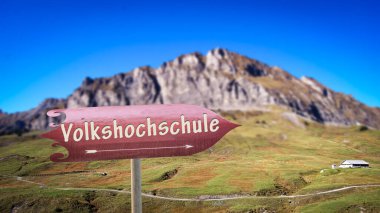 Almanca işaretli bir resim Halk Koleji 'nin yönünü gösteriyor..