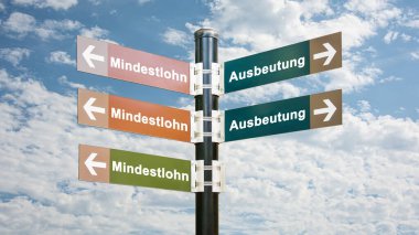 Almanca 'nın iki farklı yönünü gösteren işaret direği olan bir resim. Bir yön asgari ücrete, diğeri sömürüye işaret ediyor..