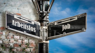 Almanca 'nın iki farklı yönünü gösteren işaret direği olan bir resim. Bir yön Job 'u işaret ediyor, diğeri işsizliği..