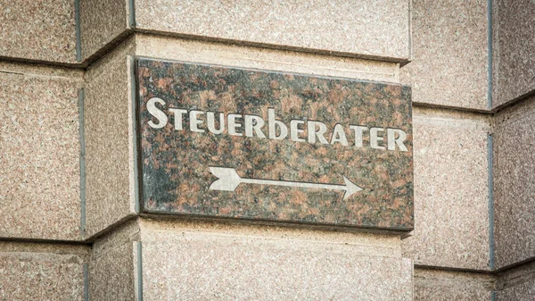 Almanca işaretli bir resim bir vergi danışmanına işaret ediyor..