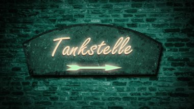 Benzin istasyonunu işaret eden Almanca işaret levhası olan bir resim..