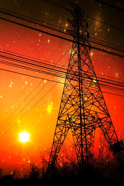 High voltage pole with sunset in front of the galaxy — Stock Photo, Image