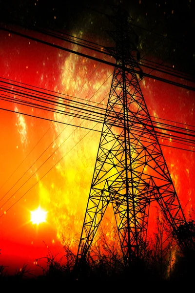 High voltage pole with sunset in front of the galaxy — Stock Photo, Image
